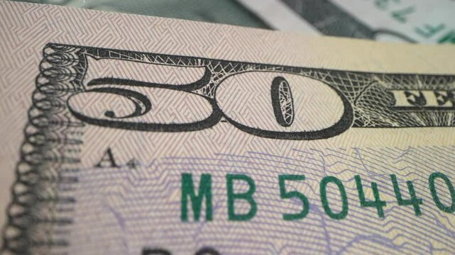 Hundred USD cash macro view. 100 Dollar Cash Stop Motion. Background Bill Sign USA Fiat Money. Hundred Dollar Closeup. Stop Motion Texture of 100 USD Bills. Concept Finance Business Investment Success