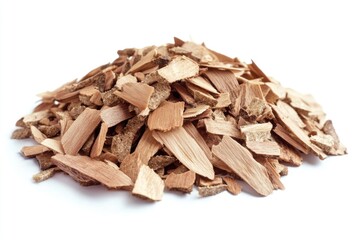A pile of wood chips sits on a clean white surface, ready for use or disposal