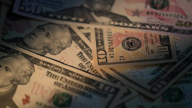 Hundred USD cash macro view. 100 Dollar Cash Stop Motion. Background Bill Sign USA Fiat Money. Hundred Dollar Closeup. Stop Motion Texture of 100 USD Bills. Concept Finance Business Investment Success