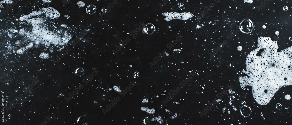 Poster water bubbles create dynamic movement against a black background with transient effects