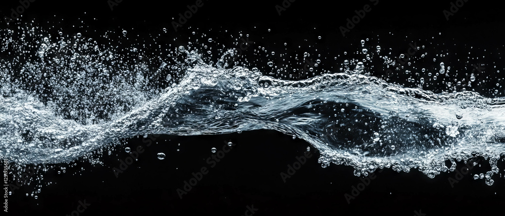 Poster bubbles form and pop in a flowing pattern, creating a captivating visual on a dark backdrop