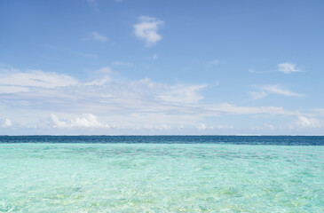 Tranquil Seascape with Clear Blue Waters and Scenic Skies