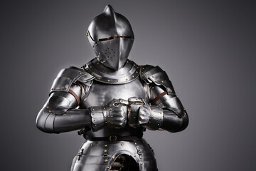 Medieval Knight in Full Suit of Armor with Displayed Strength..