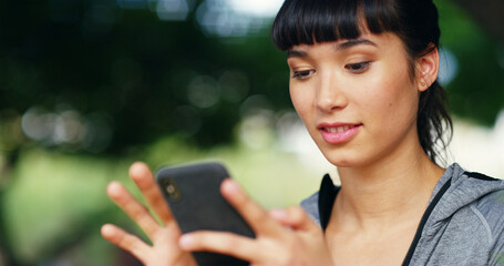 Outdoor, woman and fitness with mobile for scroll, online exercise and download app for training....