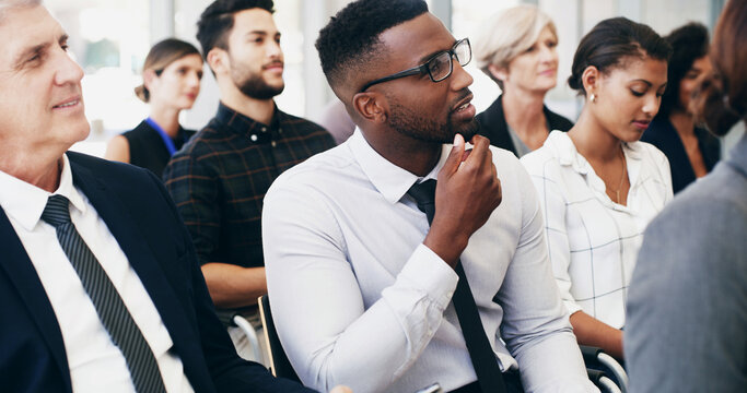 Office, business people and man in workshop for listening, training and event for corporate firm. Employees, audience and development with accountant for conference, seminar and learning for career - Powered by Adobe