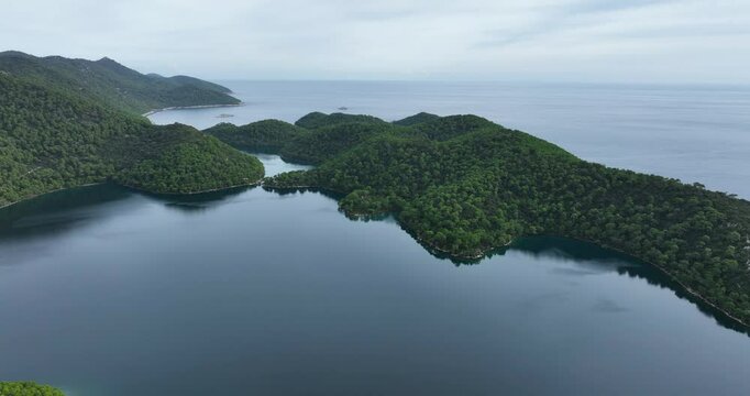 Lush green islands and serene waters of mljet national park in croatia, aerial view