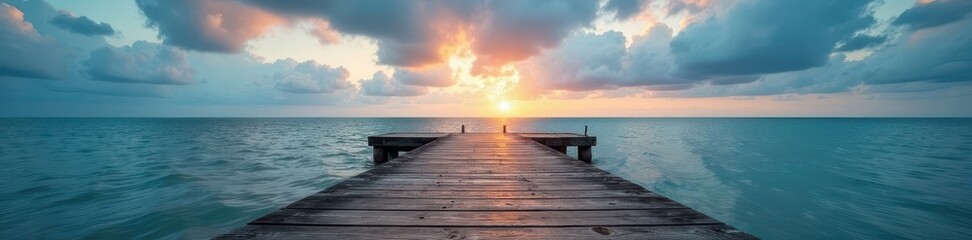 Obraz premium Rustic wooden pier against dramatic cloudy sky and tranquil ocean , sea, wooden pier