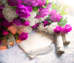 Paper with quill and flowers