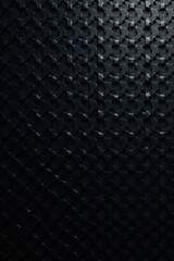 Black carbon fiber background with subtle shine, glossy, elegant