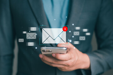 New email with notification alert, Businessman use smart phone with email in virtual screen. e-mail...