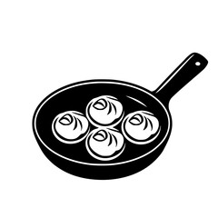 Cooking dumplings in a skillet on a stovetop at home kitchen during the daytime