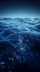 Fototapeta premium Dark Blue Ocean at Night with Glowing Bubbles