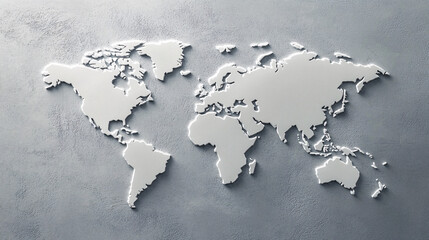 A detailed three-dimensional world map with raised continents casting soft shadows on a textured dark concrete background creating depth
