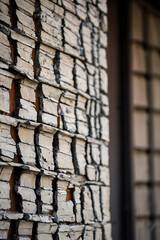 Weathered Brick Wall Texture: Grunge Background, Aged Stone Pattern, Decaying Facade Detail