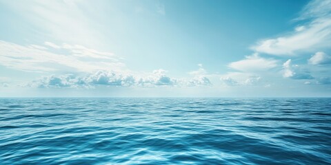 Obraz premium Serene ocean view under a bright blue sky that evokes tranquility and peace.