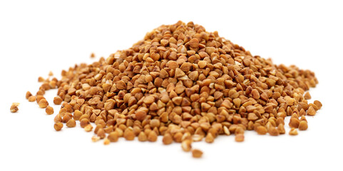 Pile of buckwheat seeds isolated.