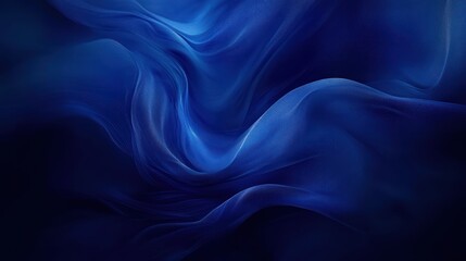 Obraz premium Abstract blue waves, flowing fabric texture, dark background.
