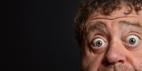 Obraz premium Close-up Photograph of a Man's Surprised Face