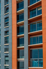 Modern Residential Building: Architectural Design and Exterior Elegance.  A captivating image showcasing the contemporary design and sleek facade of a modern residential building.