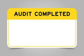 Label banner that have yellow headline with word audit completed and white copy space, on gray background