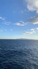 Obraz premium blue sky and sea with clouds