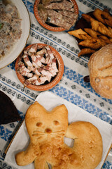 rich village table, pies, sausages, bread