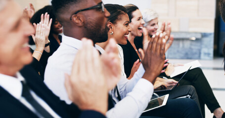 Happy, business people and seminar with applause in row for presentation, meeting or speech at office. Excited, group or employees clapping with smile for staff training, workshop or work conference