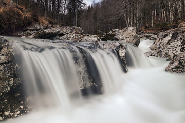 A cascade waterfall in the forrest river