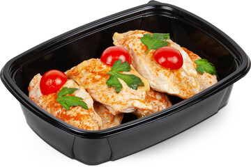 Fried chicken fillet in paprika in a black plastic lunchbox photo on a white background