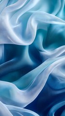 Obraz premium Serene Blue Silk Drape: Luxurious silk fabric in shades of blue creates a mesmerizing cascade of flowing lines and subtle textures.