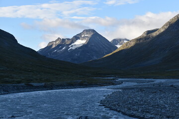 Hiking through beautiful landscapes to Galdhøpiggen in the Jotunheimen Mountain Range in Norway