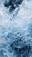 Obraz premium Icy Texture: Abstract close-up of a textured ice surface, showcasing a mesmerizing array of icy formations and a captivating blue hue.