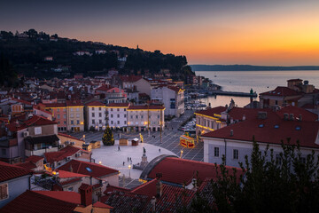 A coastal town of Piran, Slovenia in the sunset and December
