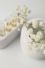 sample of parfume on white