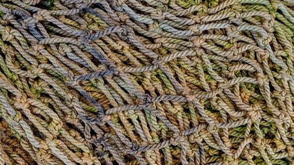  A pile of old fishing nets. Abstract background.  Close-up.