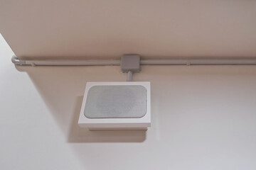 Fire alarm speaker on the wall. Emergency fire exit for sound.