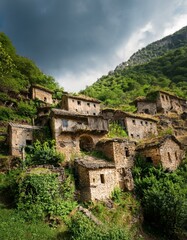 Fototapeta premium Pueblo abandonado, en la montaña cubierto de maleza por el paso del tiempo. Despoblación