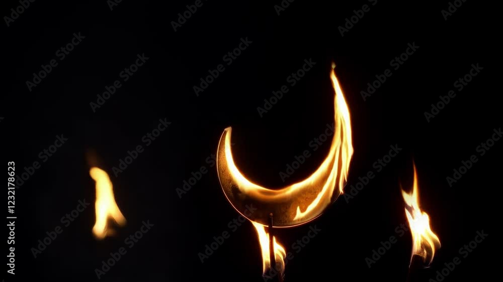Poster crescent moon and two flames burning on a black background create a mystical and symbolic atmosphere