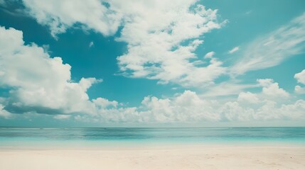 Obraz premium Beautiful tropical beach with blue sky and white clouds abstract texture background. Copy space of summer vacation and holiday business travel concept