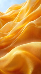Obraz premium Golden Fabric Waves: A mesmerizing abstract image showcasing the flowing, golden folds of luxurious fabric, creating a sense of elegance and ethereal beauty.