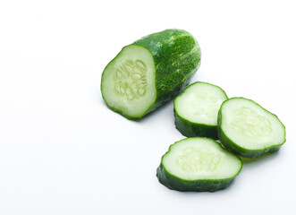 sliced cucumber isolated on white