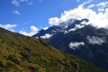 Naklejka premium Hiking in the stunning Khumbu Valley surrounded by glaciars and snowy peaks in the Himalayan Everest Base Camp Trek