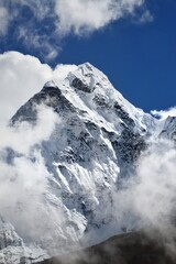 Mount Everest and the Khumbu Icefall Glacier as seen from the valley on the Everest Base Camp Trek, Nepal