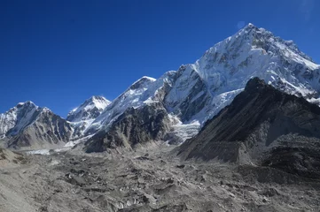 Mount Everest and the Khumbu Icefall Glacier as seen from the valley on the Everest Base Camp Trek, Nepal