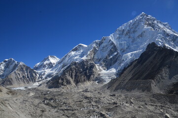 Mount Everest and the Khumbu Icefall Glacier as seen from the valley on the Everest Base Camp Trek,...