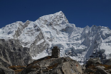 Mount Everest and the Khumbu Icefall Glacier as seen from the valley on the Everest Base Camp Trek,...