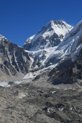 Mount Everest and the Khumbu Icefall Glacier as seen from the valley on the Everest Base Camp Trek, Nepal