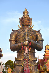 A traditional Thai giant in front of the temple in Thailand