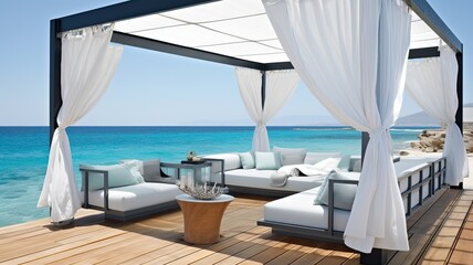 Obraz premium Relaxing in a Greek-Style Canopy Lounge Overlooking the Aegean Sea