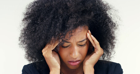 Burnout, headache and stress with woman in studio isolated on white background for anxiety or depression. Afro, migraine and pain with African person rubbing temples for relief from pressure